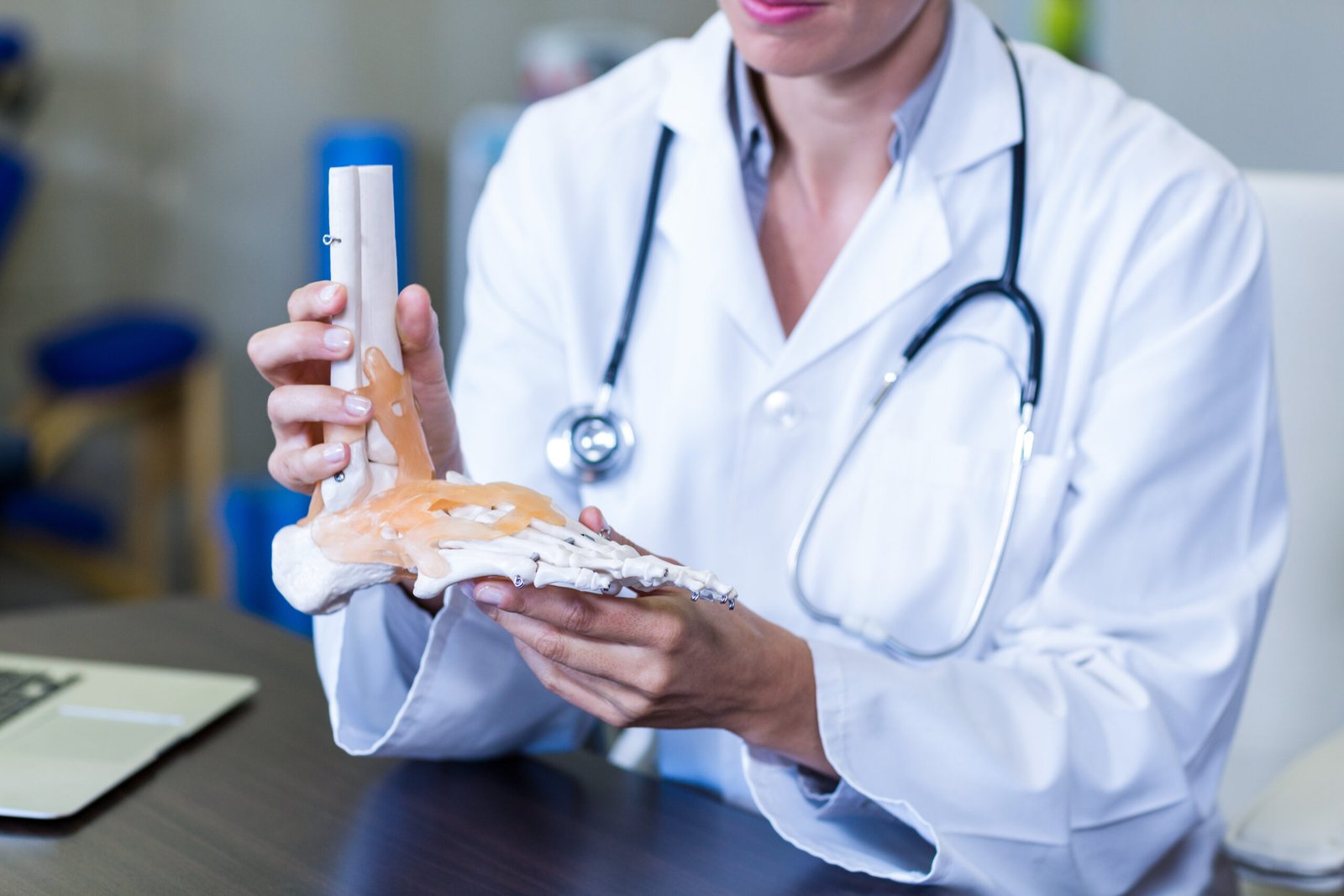 physiotherapist holding a skeleton feet model in c 2025 10 28 21 51 28 utc scaled